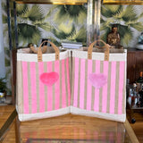 bolso rosa de yute tufting